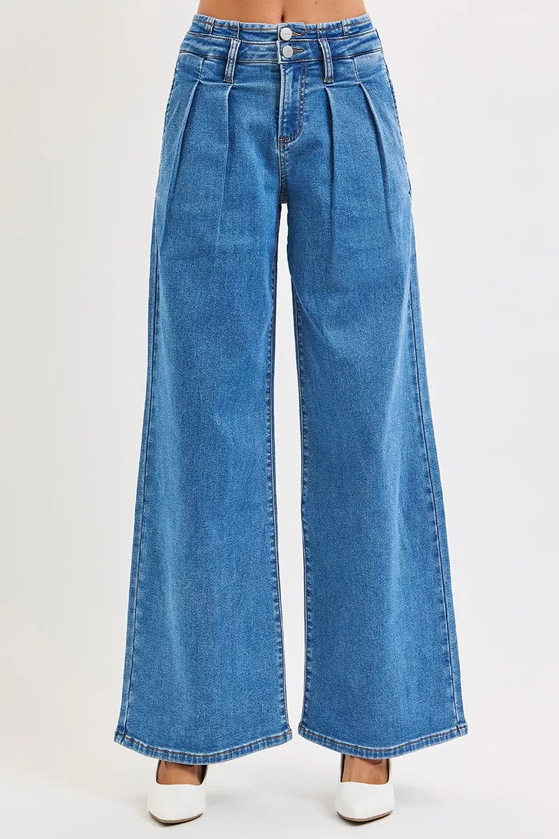 On the Rise Wide Leg Pleated Jeans Front view Blue Jeans White led, white background