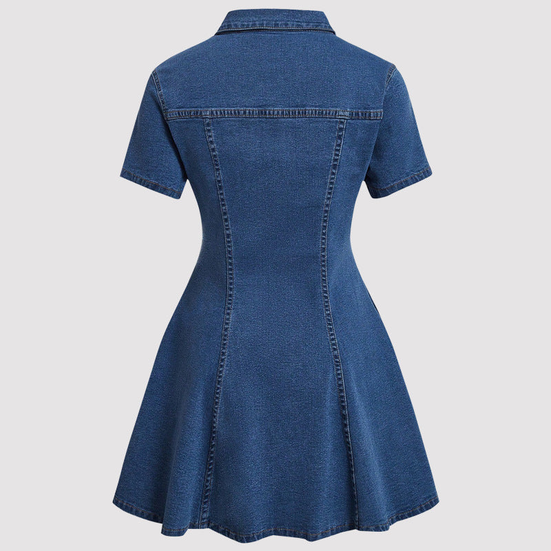 Blue denim dress on a light gray background
