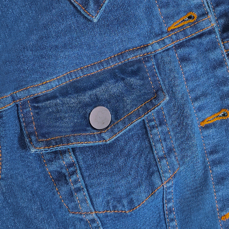 Close-up of a blue denim pocket with stitching details
