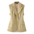 Beige vest on a white background